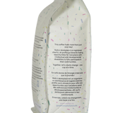 Melly's Guatemala coffee bag side panel describing charity mission supporting Canadians with disabilities in English and French